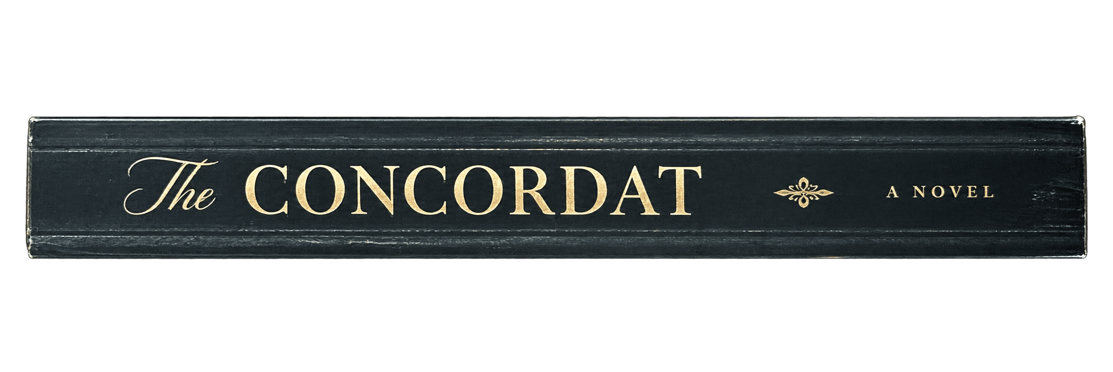 The thick printed spine of The Concordat with its title in gold